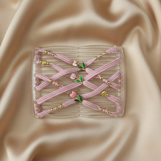 Peigne à cheveux artisanal transparent avec lanières rose croisées, perles dorées, perles roses et ornements en forme de tulipes roses avec feuilles vertes – Le peigne N°38